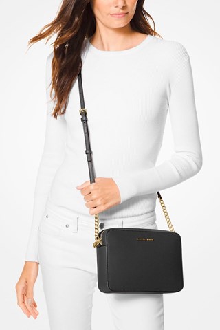 Mala a tiracolo em couro 
Preto