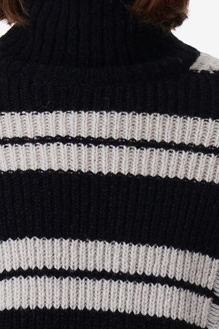 Pull en laine Omino - Noir et blanc