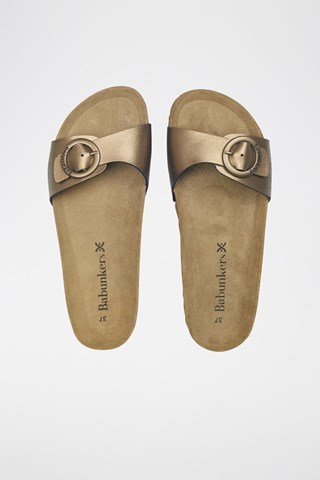 Mules em couro 
Castanho