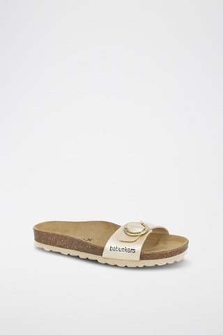 Mules em couro 
Bege