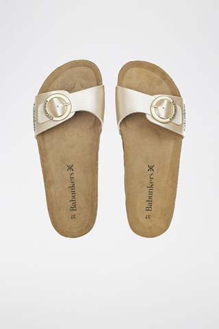 Mules em couro 
Bege