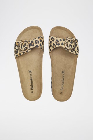 Mules em couro 
Bege