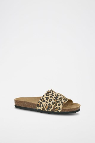 Mules em couro 
Bege