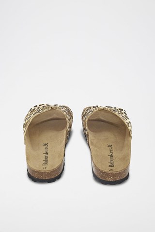 Mules em couro 
Bege