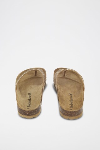 Mules em couro 
Castanho