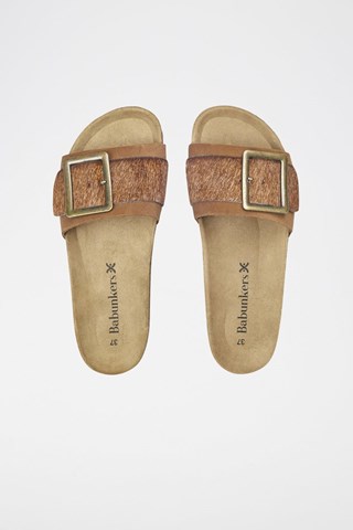 Mules em couro 
Castanho