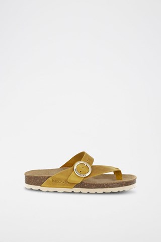 Mules em couro 
Castanho