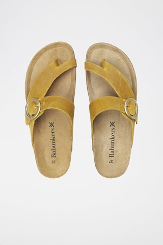 Mules em couro 
Castanho