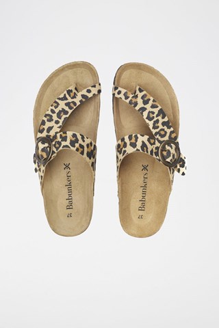 Mules em couro 
Castanho