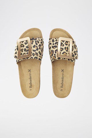 Mules em couro 
Bege